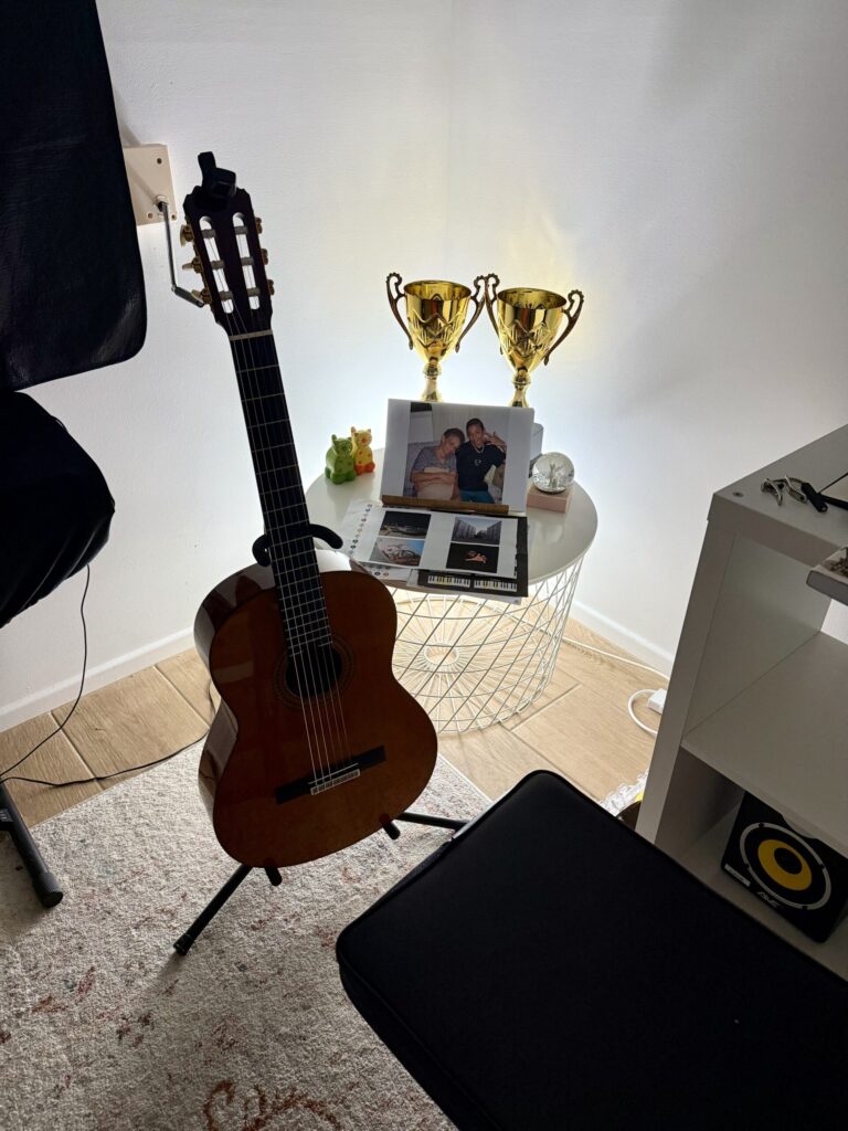 Image of a classical guitar in a home studio